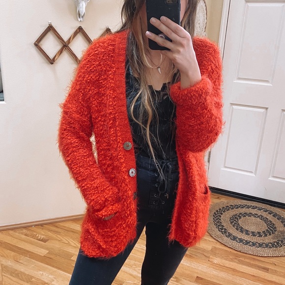 red fuzzy cardigan